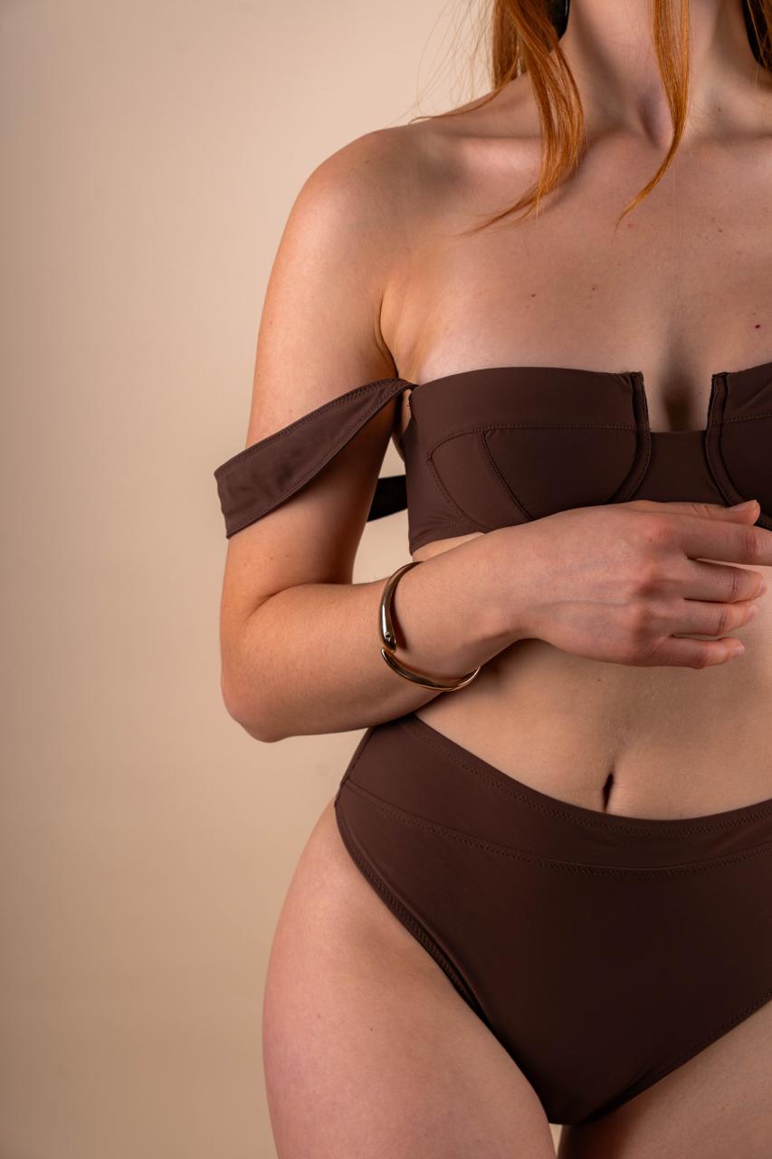 View of model wearing the brown TOKA bikini set.